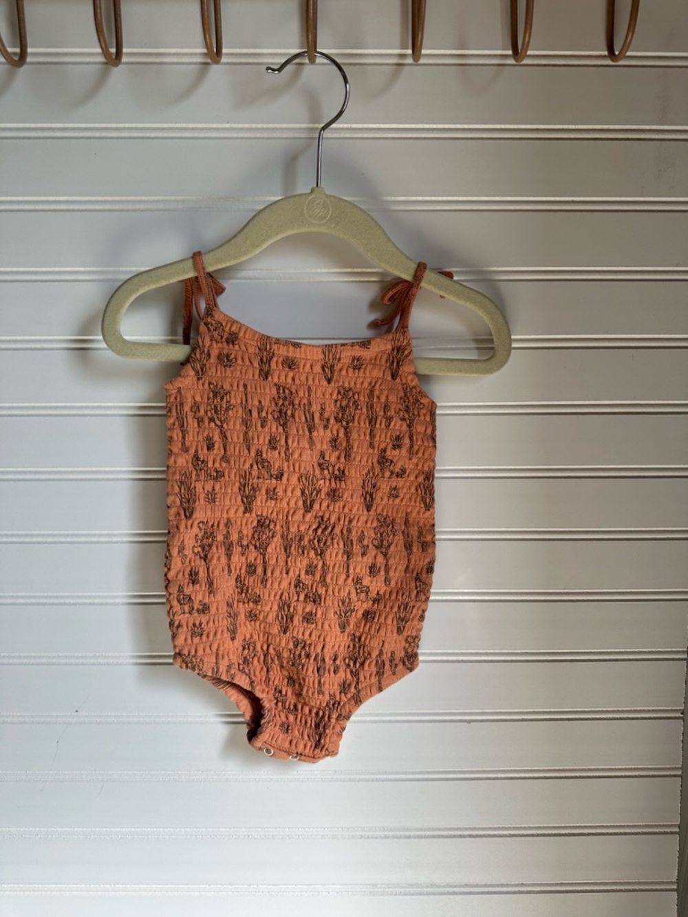 kate quinn Coral Smocked Tie-Shoulder One-Piece. Floral bodysuit from Kate Quinn